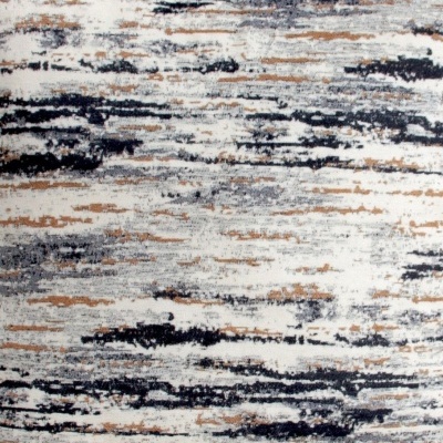 almofada retangular com padrão abstrato em tons cinza, preto e castanho sobre fundo branco