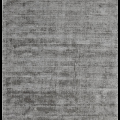 Tapete cinzento com textura felpuda e padrão irregular