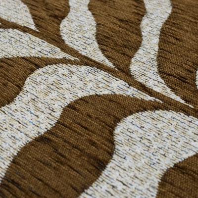 Tecido com padrão de folhas castanhas e bege texturizado
