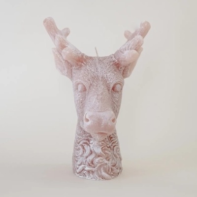 Vela em forma de cabeça de veado rosa claro