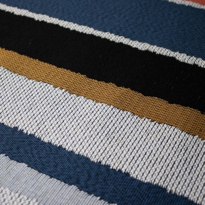 tecido riscado em azul, preto, castanho e branco com textura malha