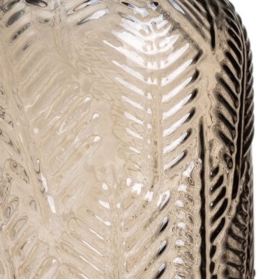 Frasco de vidro castanho claro com padrão de folhas em relevo