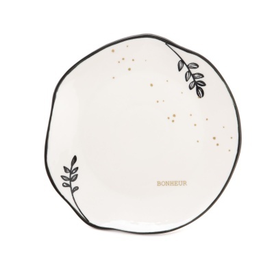 Prato branco de cerâmica com decoração de ramos pretos e estrelas douradas