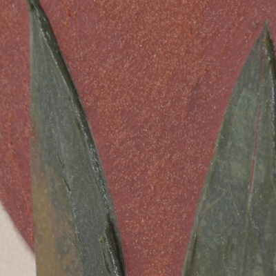 Superfície de parede texturada com pintura vermelha, verde escuro e bege e formas alongadas em verde