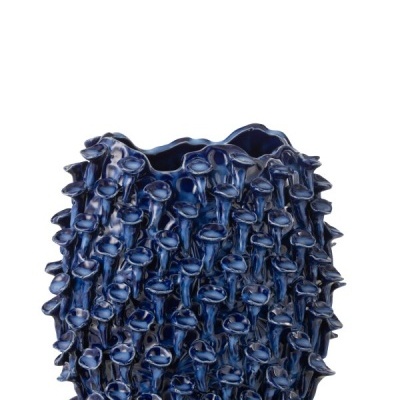 Vaso cerâmico azul escuro com textura pontiaguda e protuberâncias tubulares