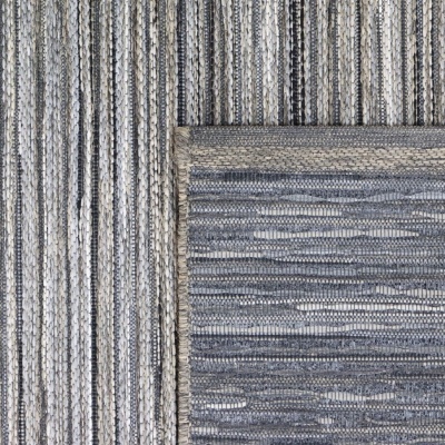 Tapete têxtil com padrões de listras em tons de cinza, azul e bege