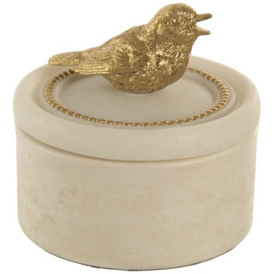 Caixa redonda de mármore bege com tampa e pássaro decorativo dourado.