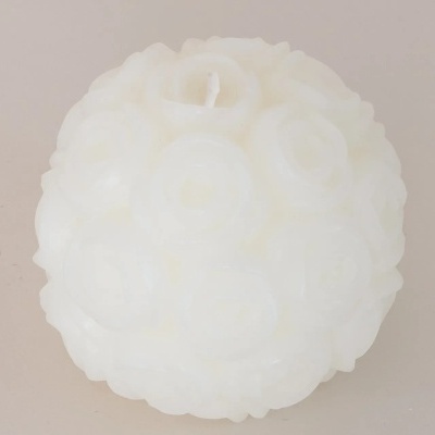 Vela branca redonda com relevo de rosas