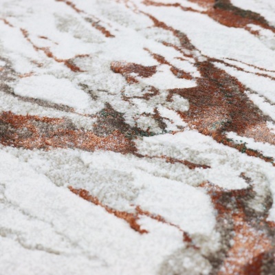 Tapete felpudo com padrão abstrato em vários tons