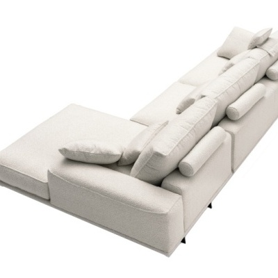 Sofá modular branco com várias almofadas