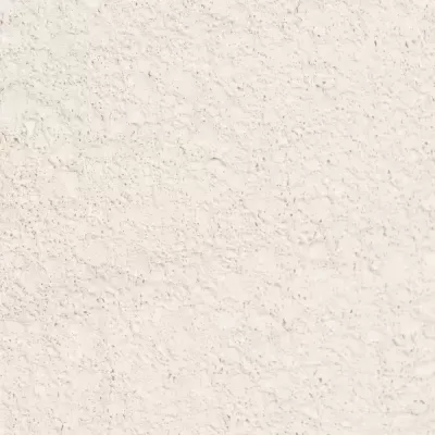 Superfície texturada creme com padrão rugoso irregular