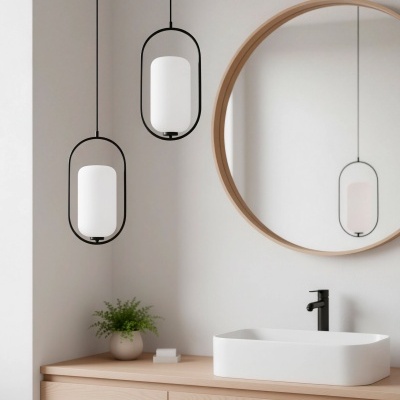 Lavatório branco em móvel de madeira com luminárias suspensas e espelho redondo