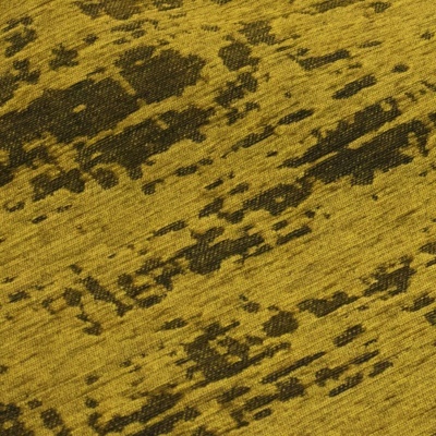 Tecido amarelo com padrão preto irregular e textura de malha