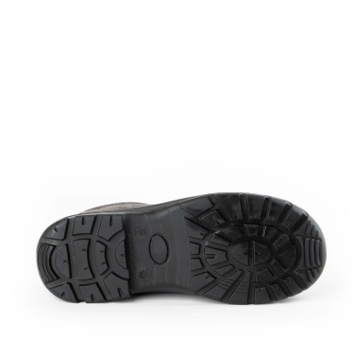 Sola preta de sapato com padrão antiderrapante em fundo branco