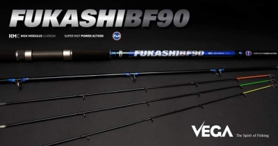 Varas de pesca VEGA Fukashi BF90 preto e azul com apontadores coloridos sobre fundo preto.