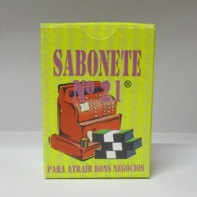 Caixa amarela de sabonete com imagem de caixa registadora e maços de notas