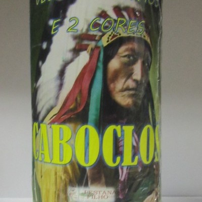 Vela verde com imagem de homem indígena, texto 'VELÃO 3 PAVIOS E 2 CORES CABOCLO'