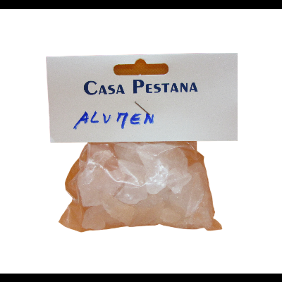 Saco plástico transparente com cristais cor de rosa e etiqueta com texto CASA PESTANA e escrita manuscrita azul