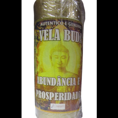 Vela amarela com rótulo de Buda e textos sobre abundância e prosperidade