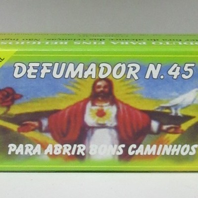 Caixa verde de defumador com imagem de Jesus e texto promocional.