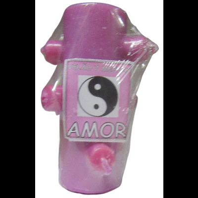 Vela cor-de-rosa com símbolos de Yin Yang e a palavra AMOR