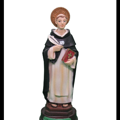 Estátua religiosa de santo com hábito branco e capa preta, segurando pena e livro, base verde com texto