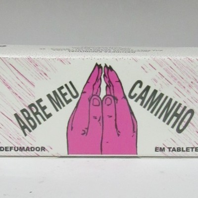 Caixa branca de defumador em tabletes com texto e ilustração de mãos cor-de-rosa em oração