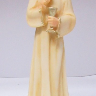 Figurinha de anjo com túnica creme e base castanha com texto