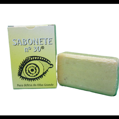 Sabonete nº 30 em caixa verde com desenho de olho grande e sabonete bege claro.