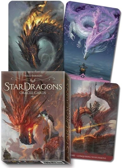 Caixa e várias cartas oráculo Star Dragons com ilustrações de dragões em cores laranja, roxo e cinzento