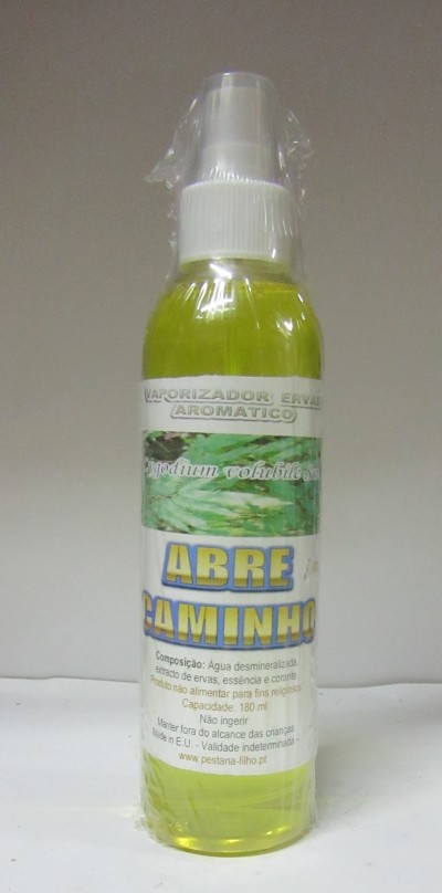 Frasco spray amarelo com rótulo ABRE CAMINHO