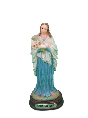 Estátua de S. Maria Goretti com vestido azul e manto branco segurando flores, base castanha com texto