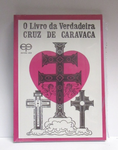 Capa do livro O Livro da Verdadeira Cruz de Caravaca com ilustrações de cruzes e coração cor-de-rosa