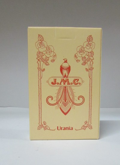 Caixa creme com design vermelho e texto J.M.C. e Urania