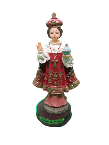 Estátua do Menino Jesus de Praga com manto vermelho e coroa dourada
