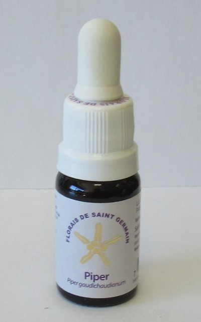 Frasco pequeno com conta-gotas branco e rótulo branco com texto e símbolo amarelo