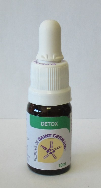 Frasco pequeno de vidro com conta-gotas e rótulo floral