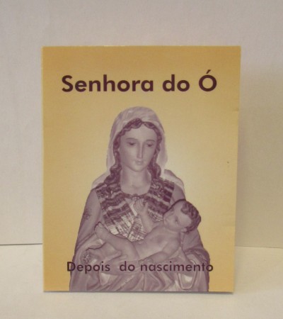 Capa de livro amarela com estátua monocromática de Senhora do Ó segurando bebé e textos 'Senhora do Ó' e 'Depois do nascimento'
