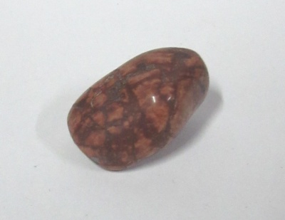 Pedra polida castanha com padrão marmoreado