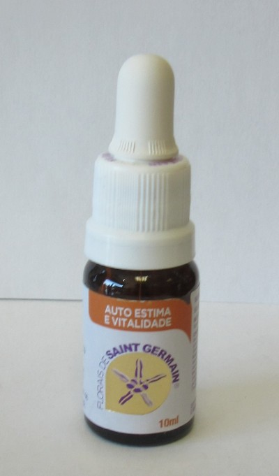 Frasco pequeno com conta-gotas, etiqueta com texto 'AUTO ESTIMA E VITALIDADE' e selo 'SAINT GERMAIN'