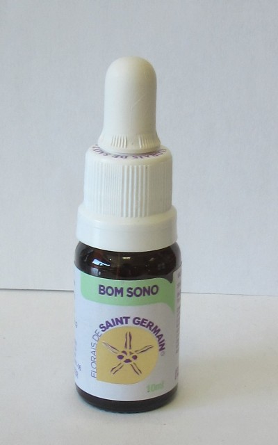 Frasco pequeno de vidro castanho com tampa branca e etiqueta branca e verde com texto e símbolo