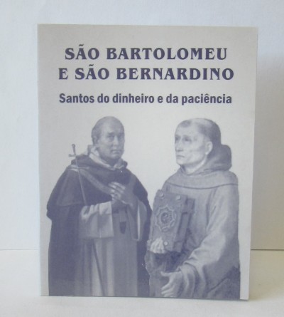 Capa de livro com estátuas e texto em português