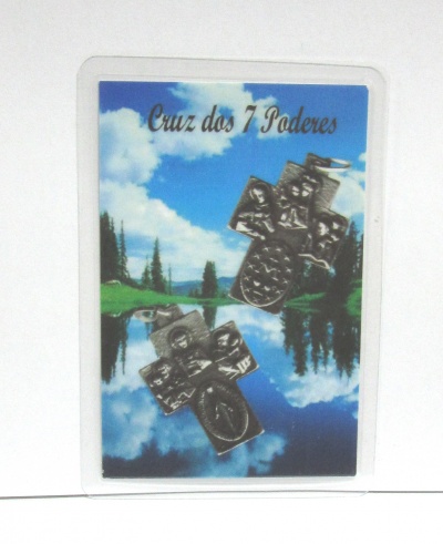 Cartão com duas cruzes decorativas sobre lago e céu azul com texto Cruz dos 7 Poderes