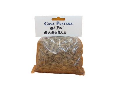 Pacote transparente com cascas secas e etiqueta branca com texto CASa PESTANA eipo' CASOELO