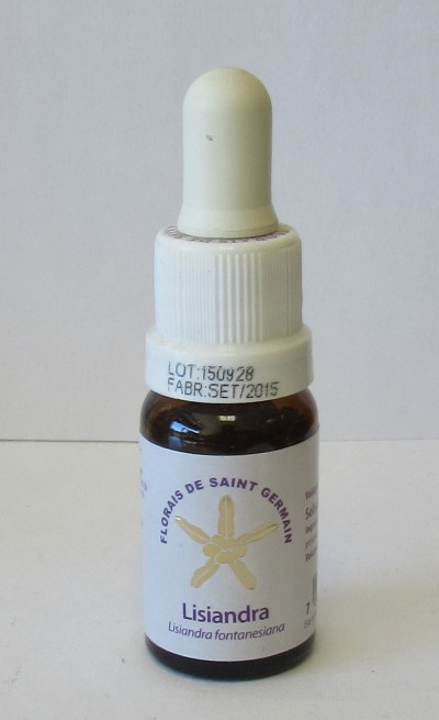 Frasco pequeno de vidro castanho com conta-gotas branco e etiqueta com texto e imagem de flor