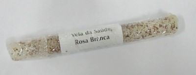Vela decorativa branca com pontos coloridos e rótulo com texto