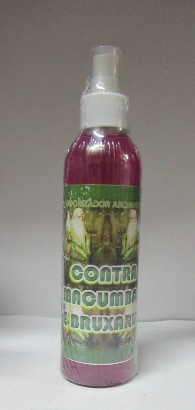 Frasco spray de líquido rosa com rótulo contra macumba e bruxaria