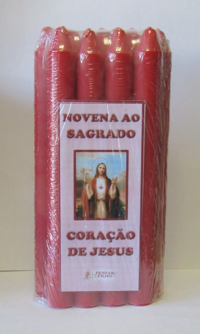 Pacote de velas vermelhas com etiqueta de novena ao Sagrado Coração de Jesus