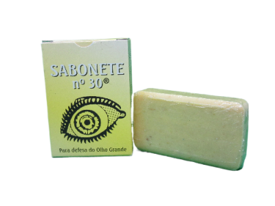 Sabonete nº 30 em caixa verde com desenho de olho grande e sabonete bege claro.