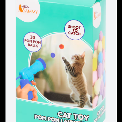 Embalagem brinquedo para gatos com lançador de bolas pom pom coloridas e imagem de gato a brincar